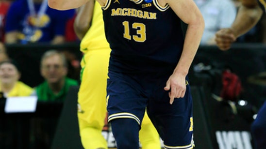 Wagner returning to Michigan, Wilson staying in draft