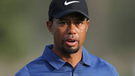 Woods feeling no pain, wants to compete again - in time