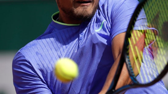 The Latest: Tsonga on brink of early French Open exit