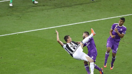 Ronaldo helps Real Madrid become 1st team to retain CL title