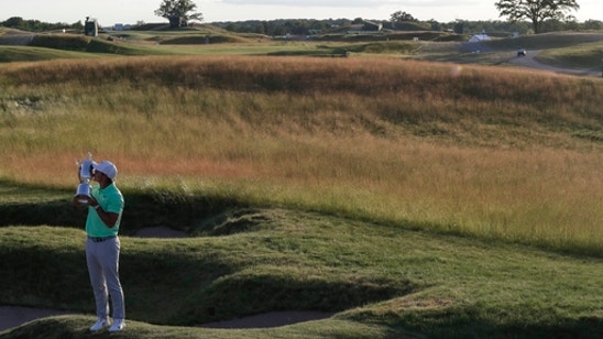 Low scores at Erin Hills has traditionalists seeing red