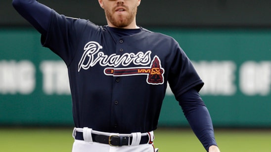 Freeman reports quick progress from broken wrist