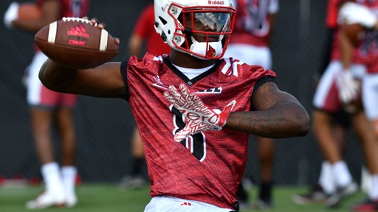 Heisman winner Lamar Jackson focused on improving his game