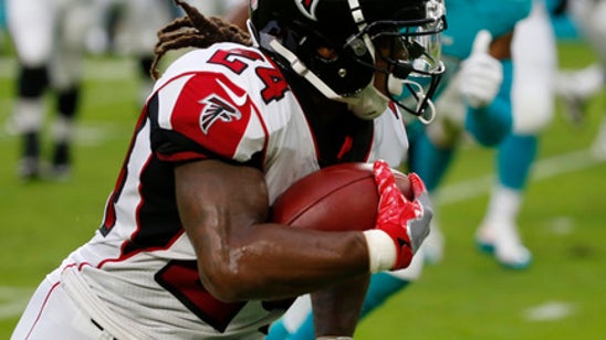 Falcons' Devonta Freeman ruled out with concussion symptoms
