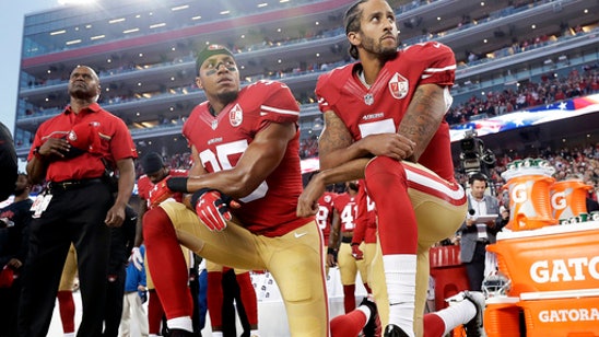 49ers' Eric Reid resumes anthem kneel, urges 'change'