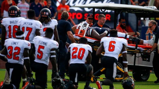 Auburn lineman Darius James carted off field with injury