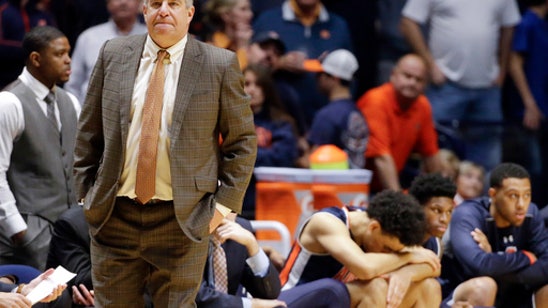 The Latest: OK State fires assistant tied to hoops scandal