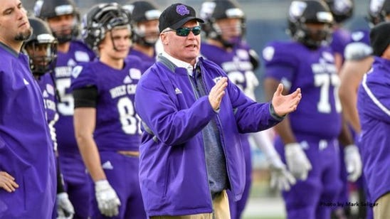 Holy Cross fire Gilmore, name Rock interim coach