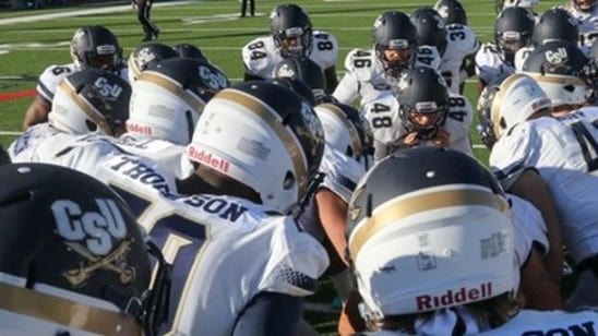 Charleston Southern players protest without helmet decal