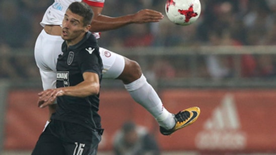 Olympiakos beats Greek leader PAOK 1-0 to trail by 1 point