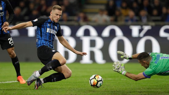 Inter beats Sampdoria 3-2 to take lead at least for a night