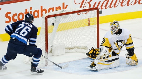 Wheeler scores 3 of Jets' 5 goals in 1st to rout Pens 7-1