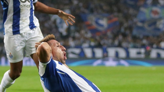 Porto beats Leipzig 3-1 to move 2nd in CL group