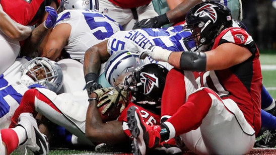 Coleman takes Falcons' lead role after Freeman's concussion