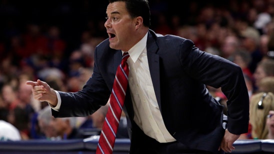 No. 2 Arizona takes lumps in paradise in crazy hoops week