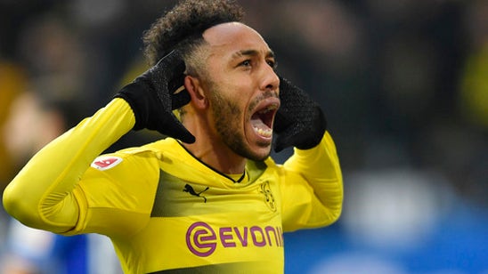 Dortmund lets 4-goal lead slip away in 4-4 draw with Schalke