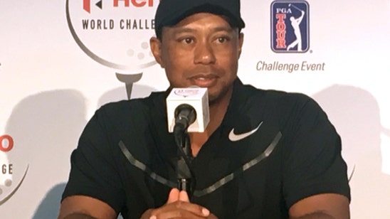Woods says he's on the 'other side' of pain and loving life