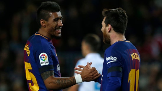 Messi misses penalty as Barca wins big to increase lead