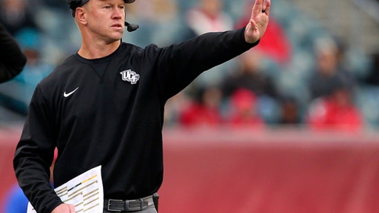 Frost, assistants busy coaching UCF, recruiting for Nebraska