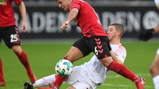 Cologne boosts survival hopes, Leverkusen 2nd in Bundesliga