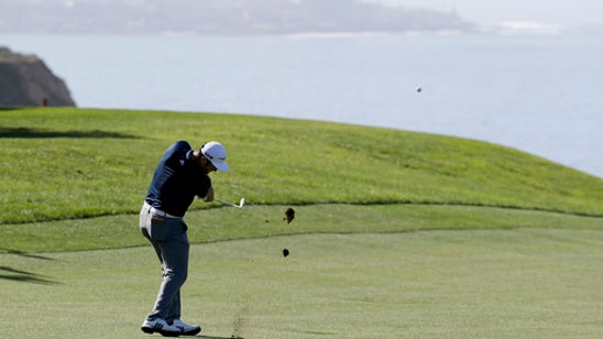 Palmer takes lead into a weekend that includes Tiger Woods
