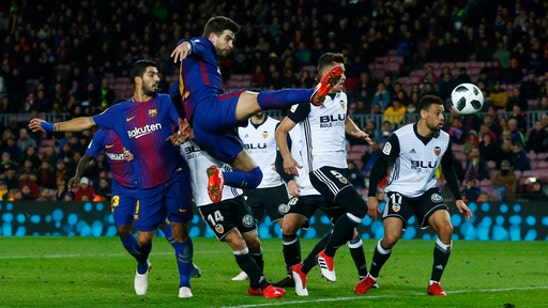 Suarez scores as Barcelona beats Valencia 1-0 in Copa semis