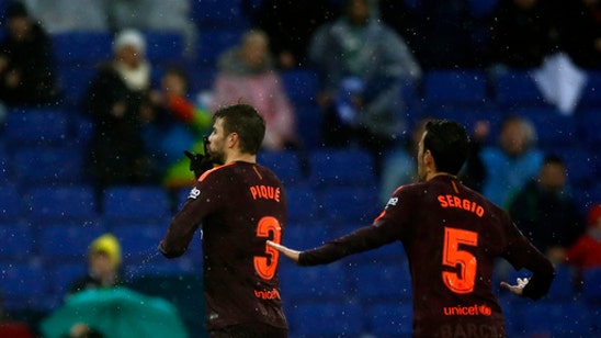 Barcelona avoids 2nd loss to Espanyol with late Pique goal
