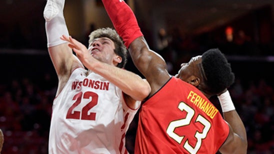 Wisconsin tops Maryland 59-54 to reach Big Ten quarters