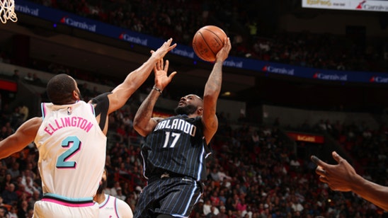 Magic withstand late Miami rally for rare road win