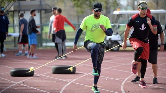 Baseball players turn to football-style training