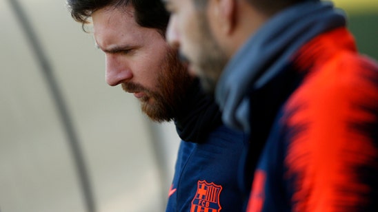 Atletico cuts Barcelona lead to 6 points with win at Malaga