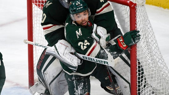 Dubnyk saves 32 as Wild hold on 3-2 against Rangers