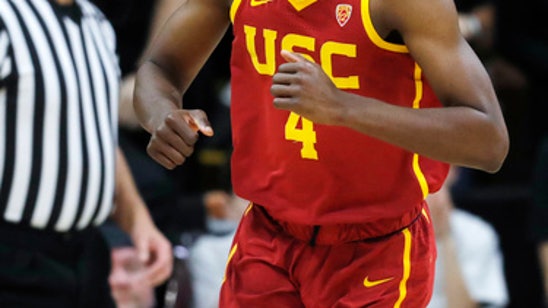 Metu scores 21, USC beats Colorado 75-64