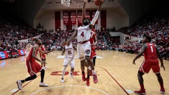 No. 16 Buckeyes keep title hopes alive with win at Indiana