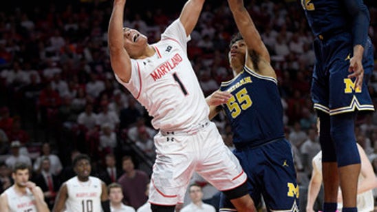 With hoops under federal probe, fans say business as usual