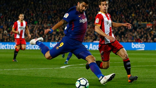 Messi, Suarez combine for 5 goals as Barca beats Girona 6-1