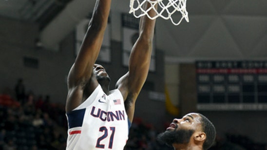 Adams scores 25 to lead UConn over Temple 72-66