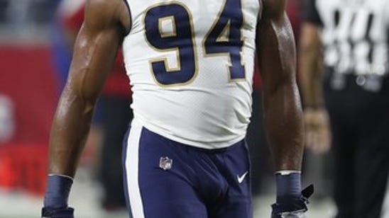 AP source: Dolphins agree to acquire Rams DE Robert Quinn