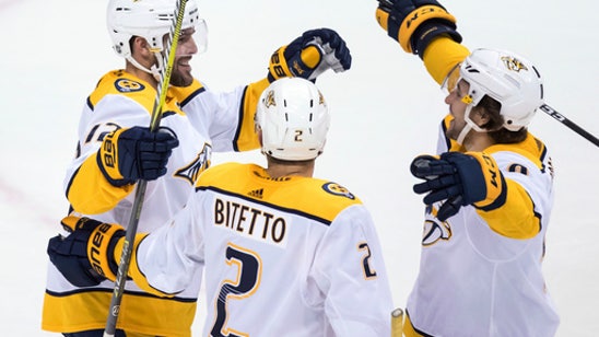 Fisher scores in 1st game back, Predators top Canucks in OT