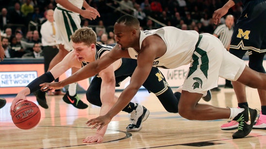Michigan ends top-seeded Spartans’ 13-game winning streak