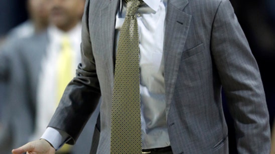 Kansas St. uses late 1st-half run to down Baylor 77-67