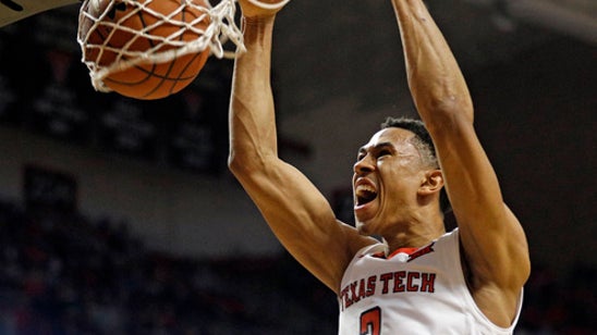 Evans, No. 12 Texas Tech top TCU 79-75 to stop 4-game skid