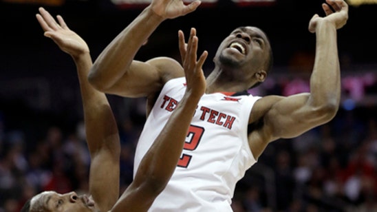 Evans leads Texas Tech to 73-69 win over Texas in Big 12s