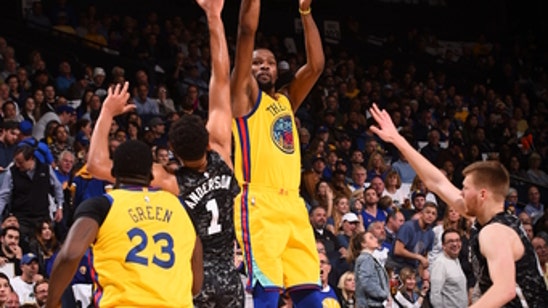 After Curry goes down, Durant rallies Warriors past Spurs