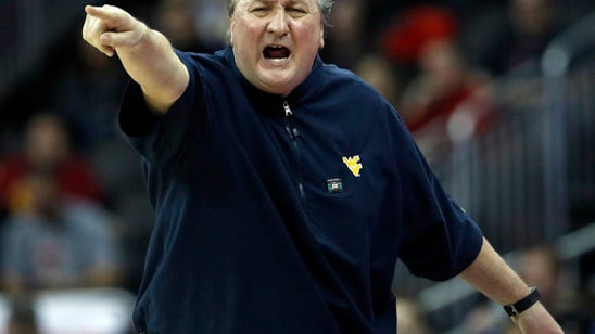 No. 18 West Virginia tops No. 14 Texas Tech 66-63 at Big 12s