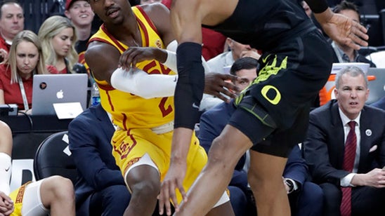 USC rolls past Oregon 74-54 into Pac-12 title game