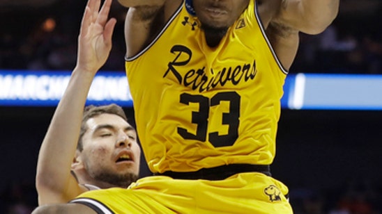 No. 16 UMBC stuns No. 1 Virginia 74-54 to make NCAA history