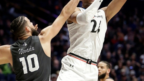 Comeback for the ages: Nevada edges Cincinnati 75-73