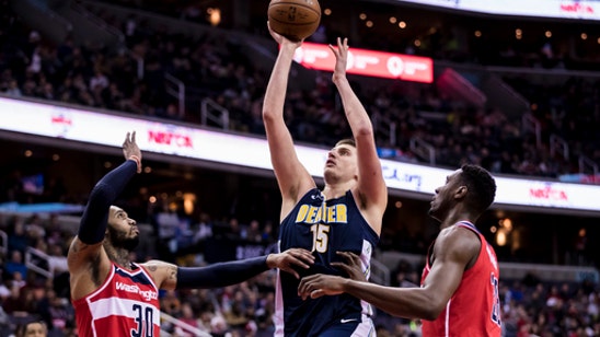 Jokic, Murray help Nuggets stay in race by beating Wizards