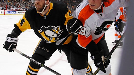 Rust’s OT winner gives Penguins season sweep of Flyers